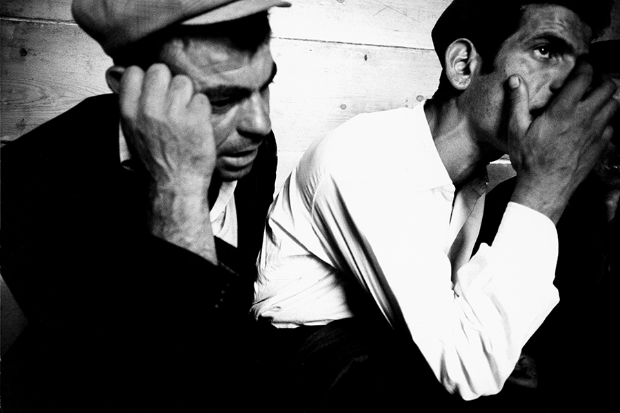 Orgosolo. Choir singers in a tavern, 1960