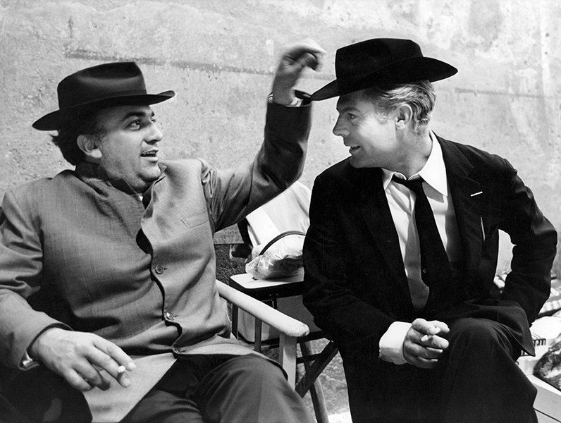 Federico Fellini and Marcello Mastroianni on the set of Otto e mezzo, 1963